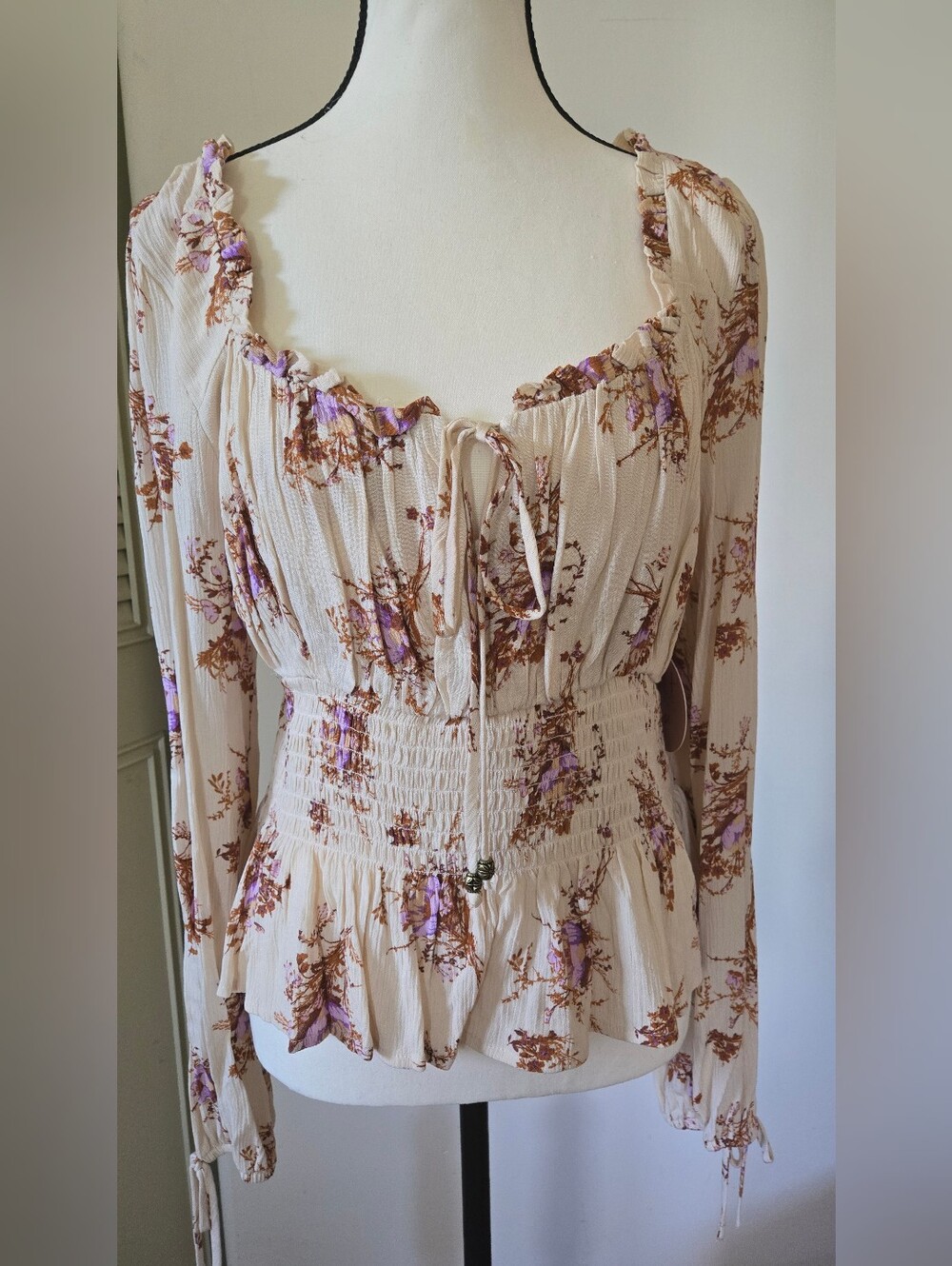 Cream Floral Long-Sleeve Smocked Peplum Blouse